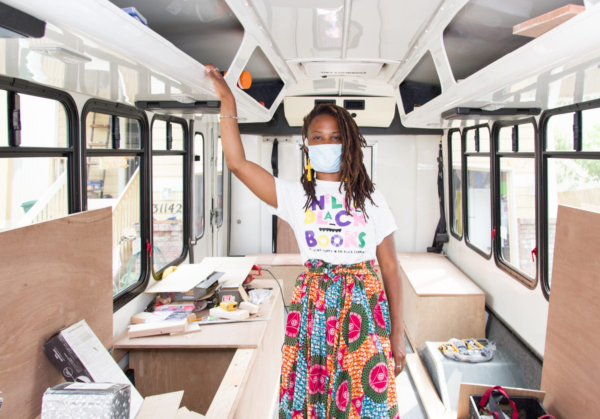 Catrice stands inside her mobile classroom
